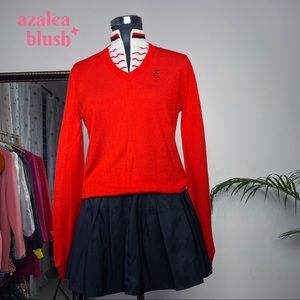 Knit top with zipper collar